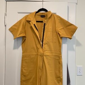 Never worn nooworks coveralls in mustard yellow